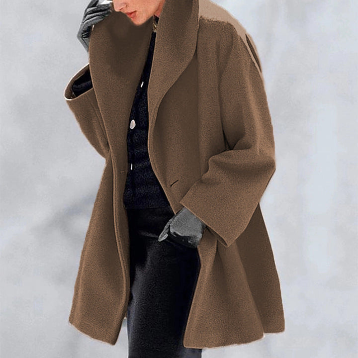 Dame trenchcoat i mykt stoff, gir optimal varme og komfort. Perfekt for en elegant vinterstil.