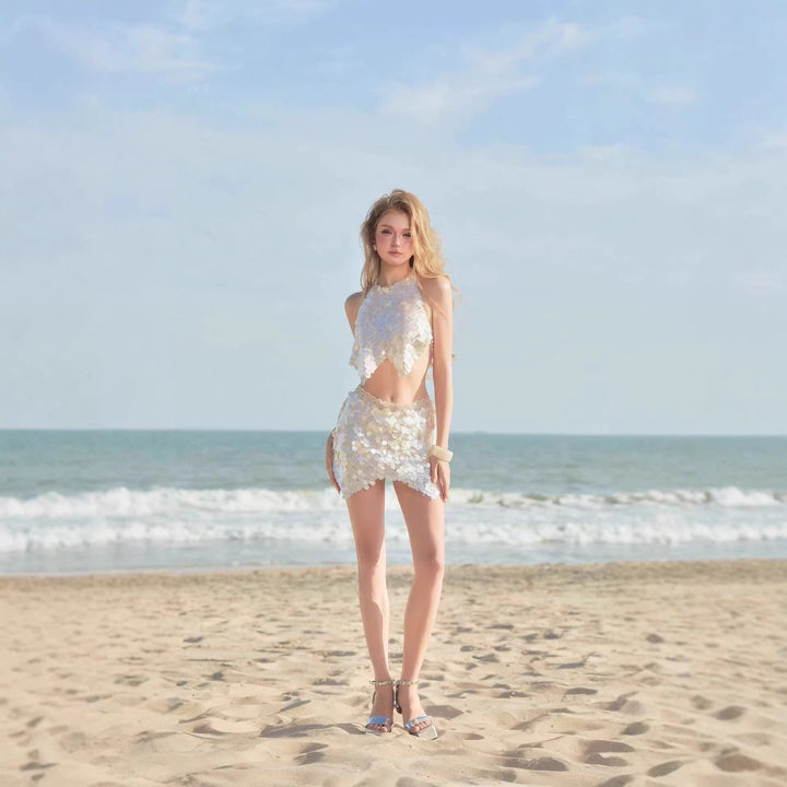 Stilfullt bikinisett med unik skjell-design til dame. Perfekt strandmote for sommerens badeferie.