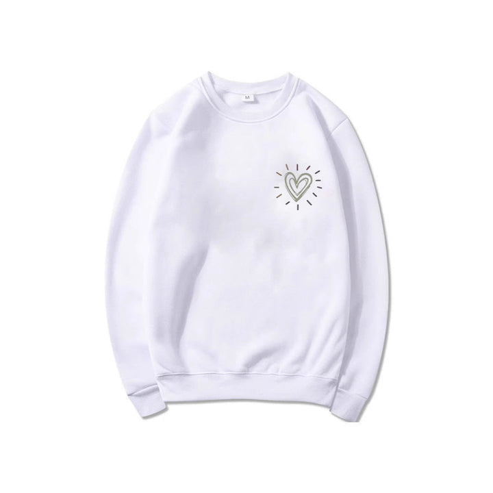 Myk damegenser i oversized modell med hjerter. En trendy og feminin fritidsgenser for alle dager.