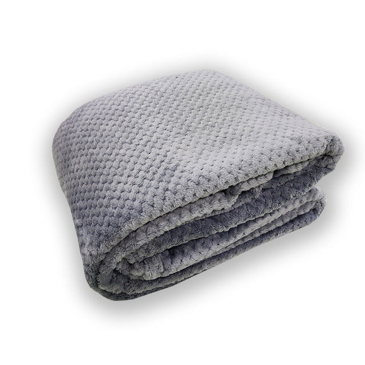 Allsidig mikrofiber-pledd med vaffelstruktur. Kan brukes som koseteppe, sofalaken eller interiørdetalj.
