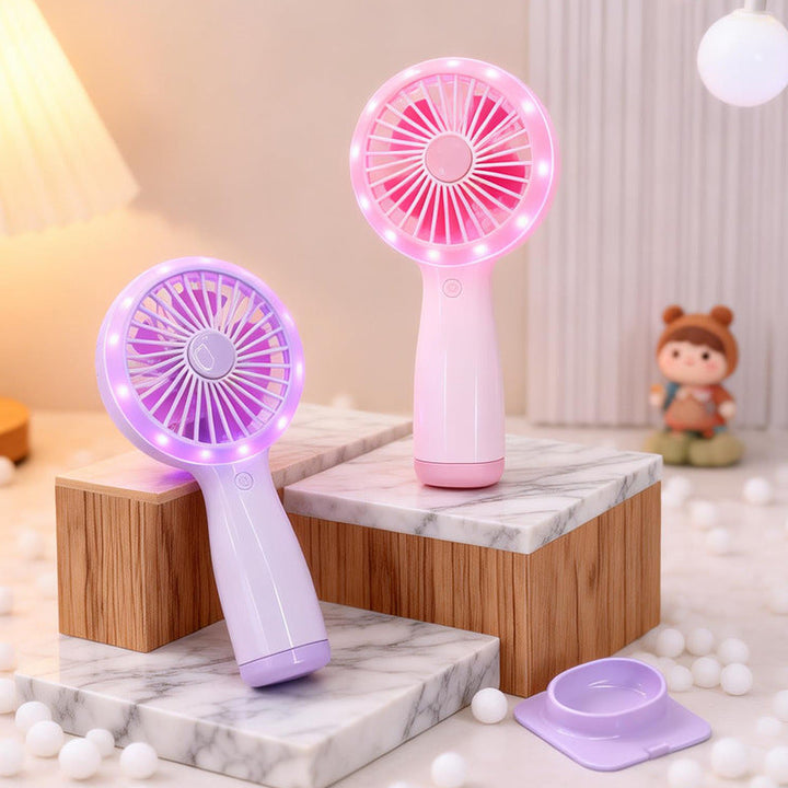 Rosa bærbar håndvifte med justerbart LED-lys, en smart gadget for kjølig komfort om sommeren.