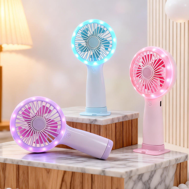 Bærbar håndvifte med LED-lys for kjølig sommer. Kompakt USB-vifte, ideell for reise og personlig bruk.
