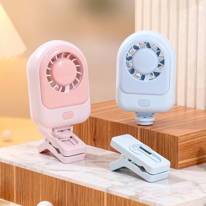 Allsidig USB-minivifte med klemme, ideell som reisevifte for camping, barnevogn eller soverom.