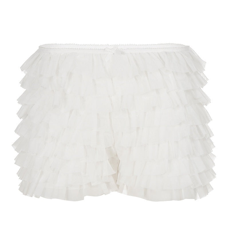 Komfortabel volangshorts med elastisk midje, designet for en avslappet og chic sommerstil.