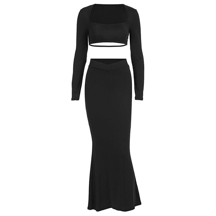 Elegant sett for kvinner: Svart crop top og matchende maxiskjørt med stilfull transparent detalj.