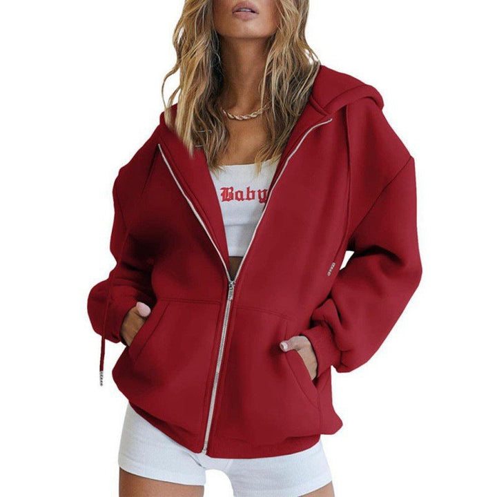 Stilren dame hettegenserjakke, oversized med dype lommer. Perfekt for en casual og trendy look.