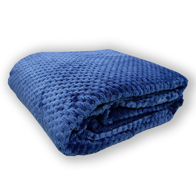 Vaffelstruktur-teppe i mikrofiber for dame. Et lett og varmt pledd som passer til alle interiørstiler.