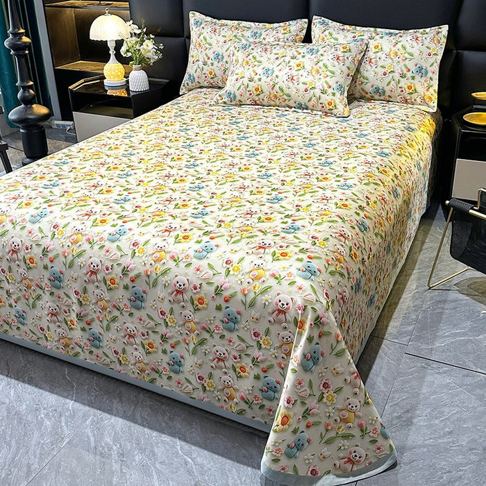 Stilfullt sengeteppe med vakkert blomstermønster og svaner; essensielt for elegant hjemmeinnredning.