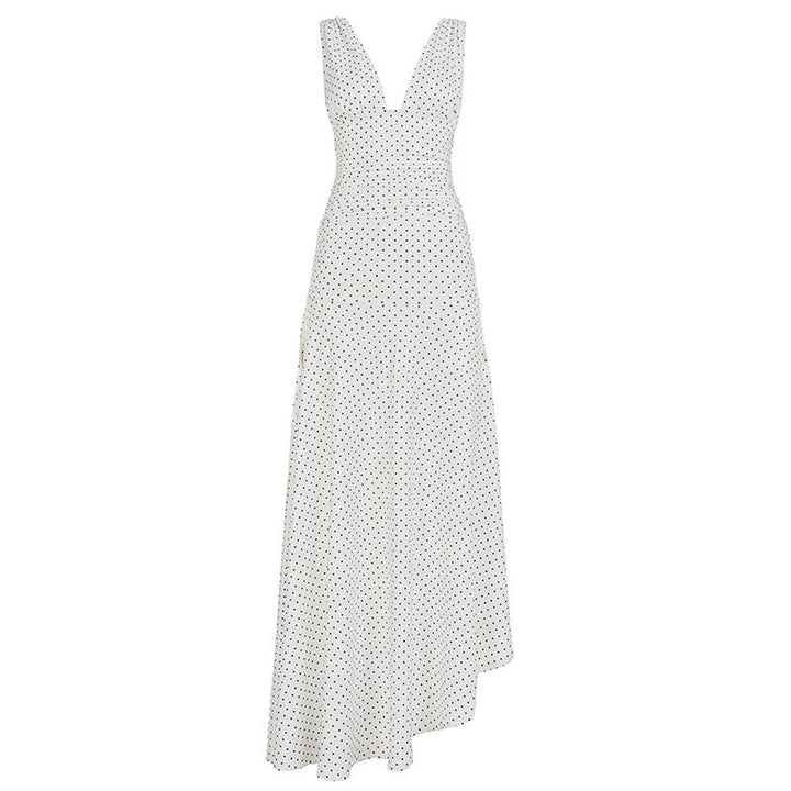 Elegant hvit prikket maxikjole for damer, med dyp V-hals, asymmetrisk skjørt. Ideell sommer- og strandkjole.