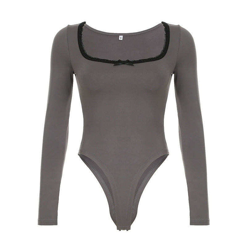 Ryggbilde av elegant svart langermet bodysuit for kvinner, viser sømløs passform og tidløs design.