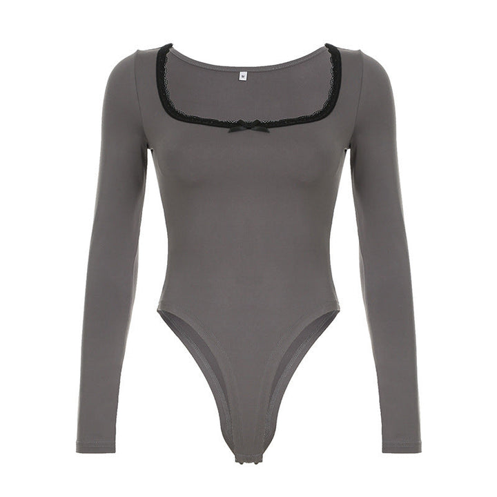 Ryggbilde av elegant svart langermet bodysuit for kvinner, viser sømløs passform og tidløs design.