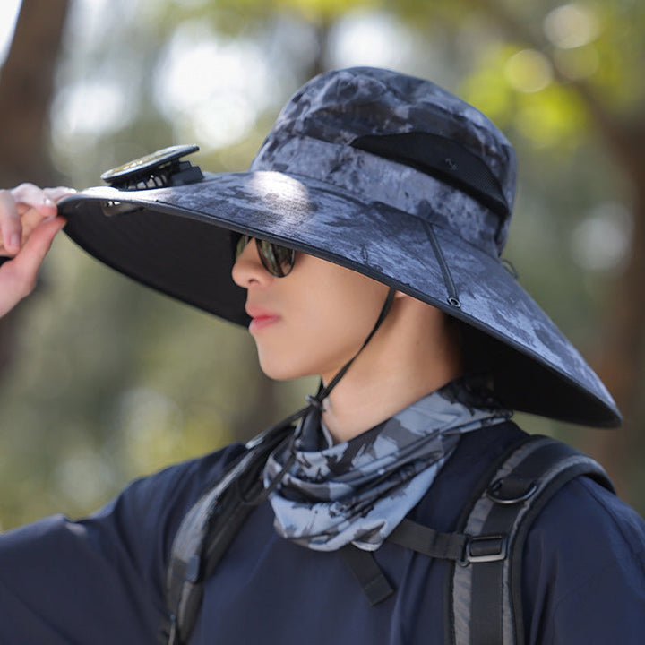 Grå unisex solhatt med UV-beskyttelse og bred brem for utendørs bruk. Ideell som tur- og fiskehatt.