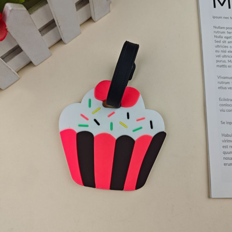 Praktisk cupcake bagasjemerke i silikon for rask og enkel identifisering av reisevesken din.