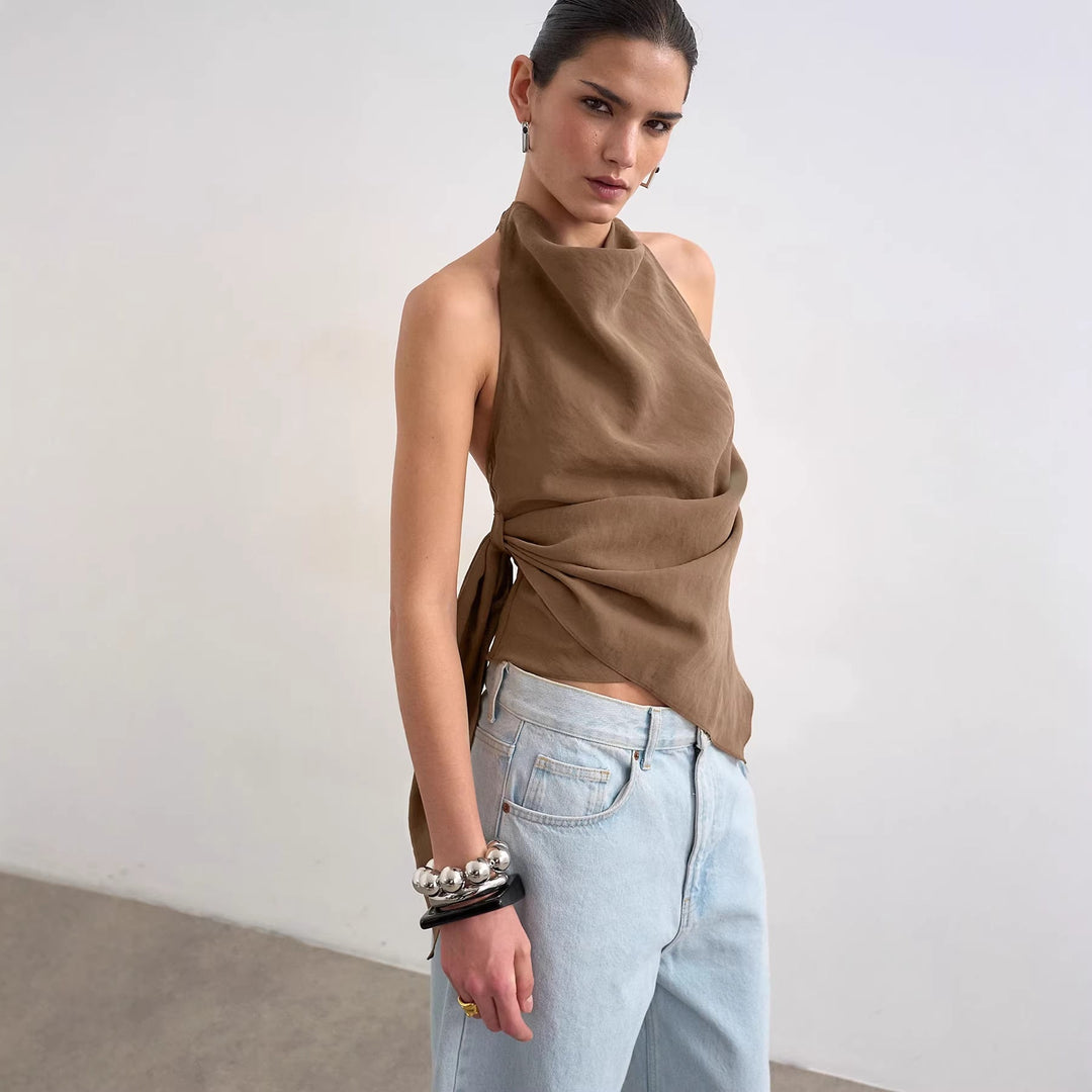 Elegant dame omslagstopp med trendy asymmetrisk design. Behagelig passform for kvinner, ideell for fest.
