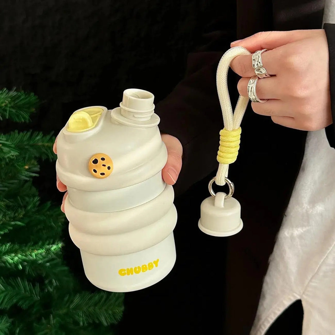 Elegant dame sport vannflaske i rustfritt stål, holder drikken kald, ideell for aktiv hverdag.