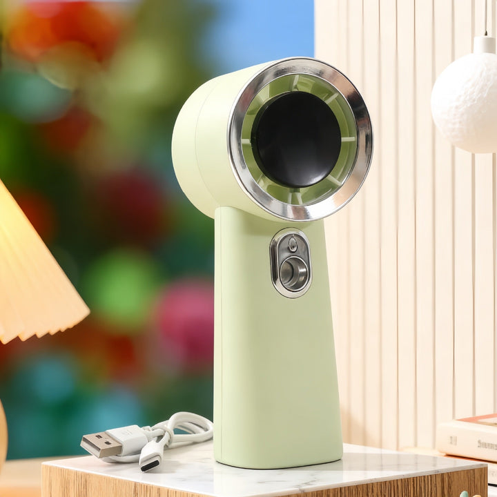 Lettvektig minivifte med kraftig luftstrøm og LED-belysning, perfekt for reise.