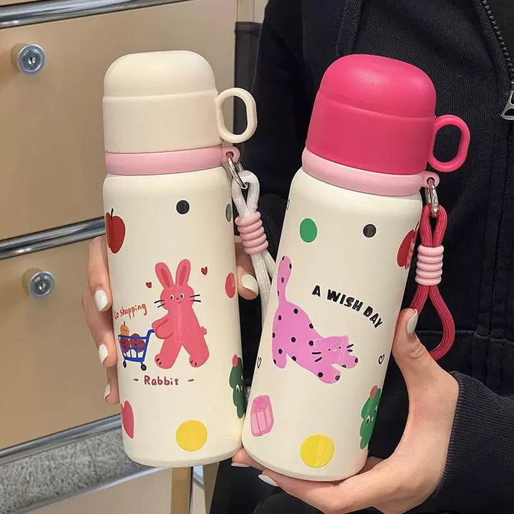 Praktisk 500 ml termoflaske for kvinner, isolert, med håndtak og unikt dyredesign. Essensiell for daglig hydrering.