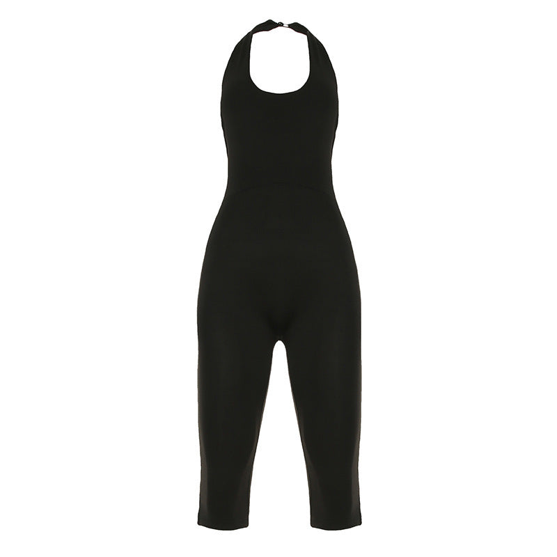 Mote-riktig svart damejumpsuit som fremhever figuren, med en lekker, elegant ryggutskjæring. Perfekt til fest.