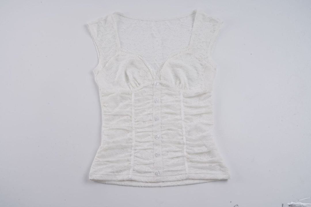 Hvit dame crop top med elegant V-hals og volanger, perfekt som festtopp eller trendy sommertopp.