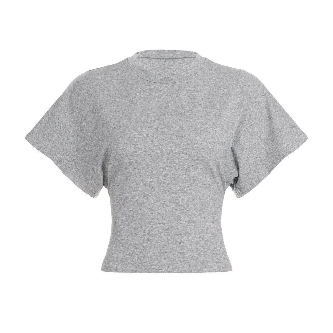 Allsidig dame crop-top, løs passform og rund hals. En komfortabel og moteriktig topp for sommeren.