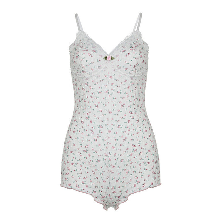 Lett og luftig hvit bodysuit for kvinner, med intrikat blomstertrykk og delikate blonder for optimal komfort.