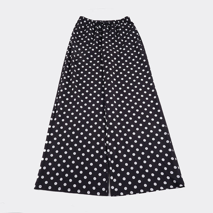 Damebukse med vide ben, elastisk midje og elegant polka prikk-design. En stilig og komfortabel hverdagsbukse.