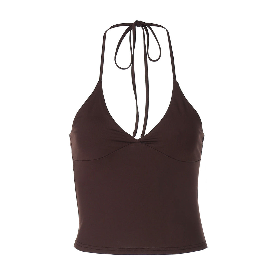 Dame topp i sommerlig stil; klassisk halterneck med delikate draperinger for en feminin touch.