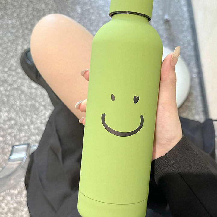 Rød 500ml termoflaske for kvinner med smilmotiv. Bærbar, isolert drikkeflaske for hverdag og gave.