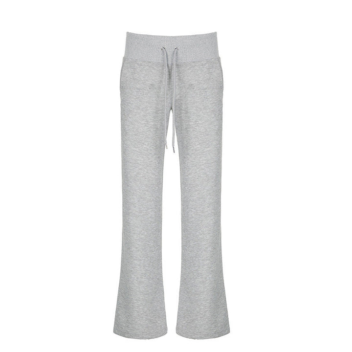 Stilfull grå dame sweatpants med trendy utsvingte flared ben. Komfortabel bukse med elastisk midje for mote.