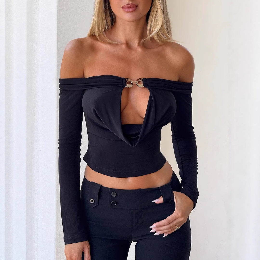 Svart elegant off-shoulder damebluse med lange ermer, en trendy festtopp for moderne kvinner.