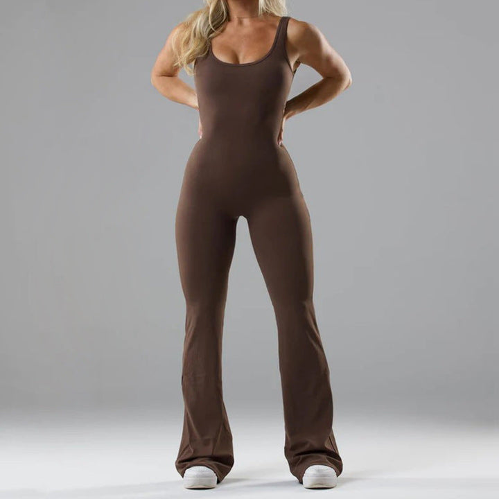 Grå sporty jumpsuit for dame, allsidig for både trening og avslapning.