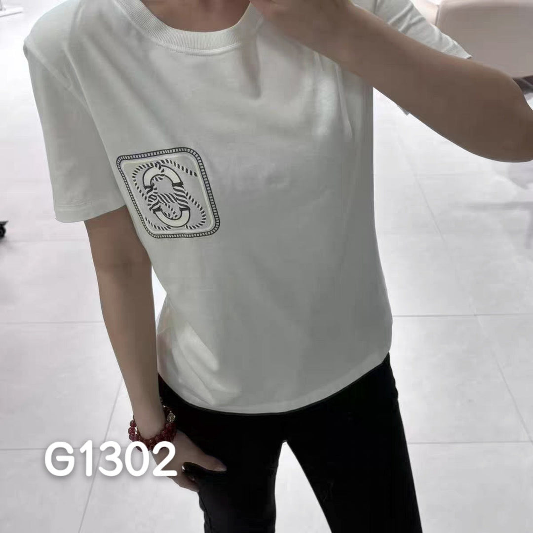 Elegant korsettbluse i svart, med gjennomsiktige ermer for en stilig look.