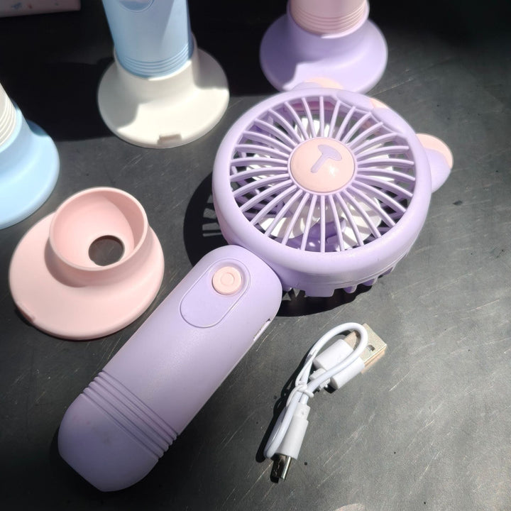 Håndholdt eller stasjonær USB-vifte i elegant design. Perfekt kompakt elektronikk for kjølig sommerbris.