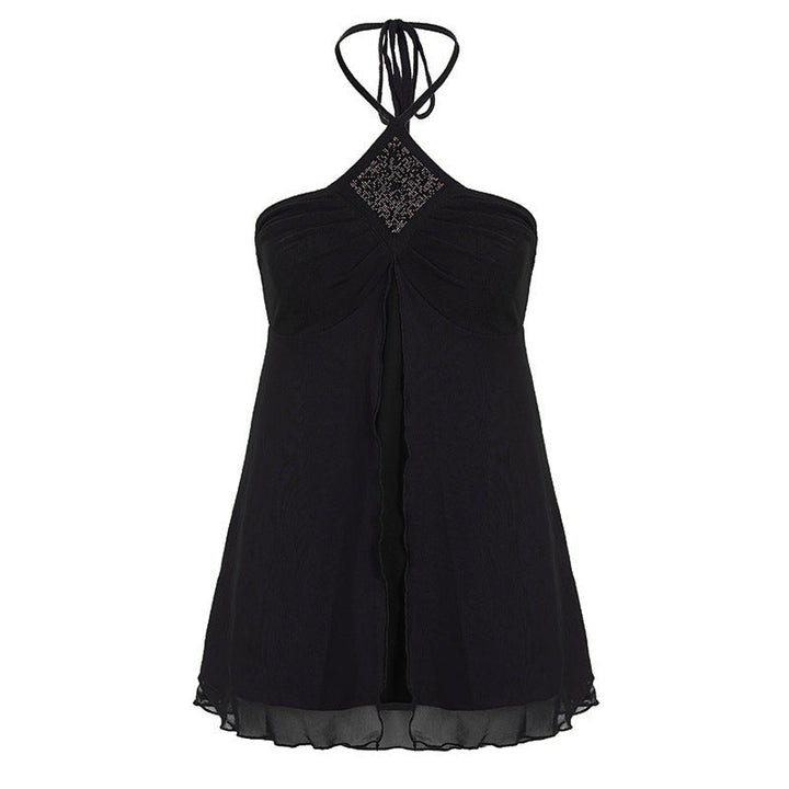 Allsidig dame halterneck topp, tilgjengelig i svart og lilla. Perfekt som elegant festtopp eller sommertopp.