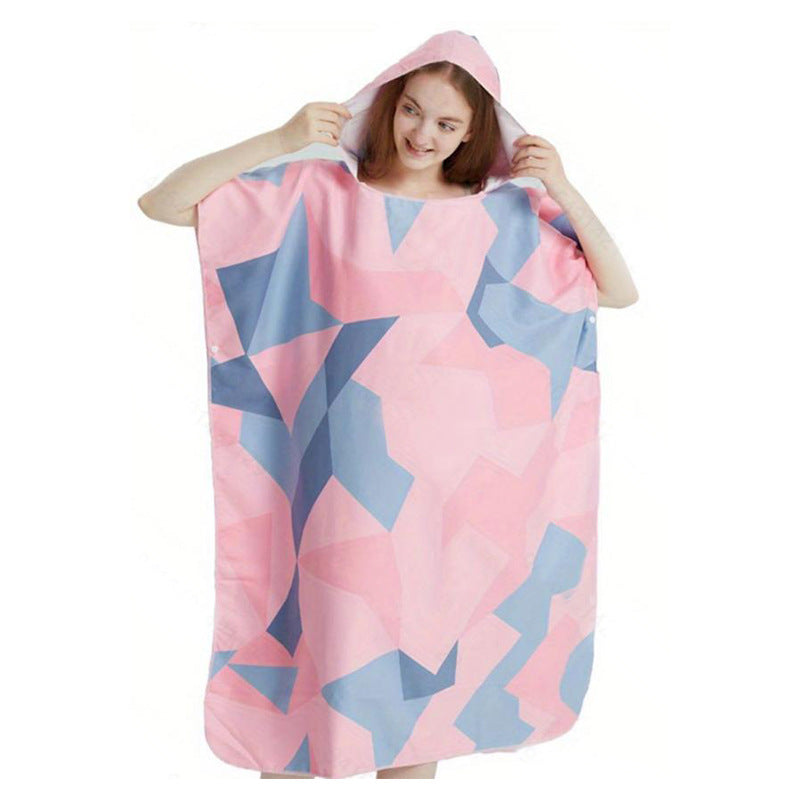 Komfortabel fargerik hetteponcho for damer, ideell som badehåndkle og for avslapning på ferie.