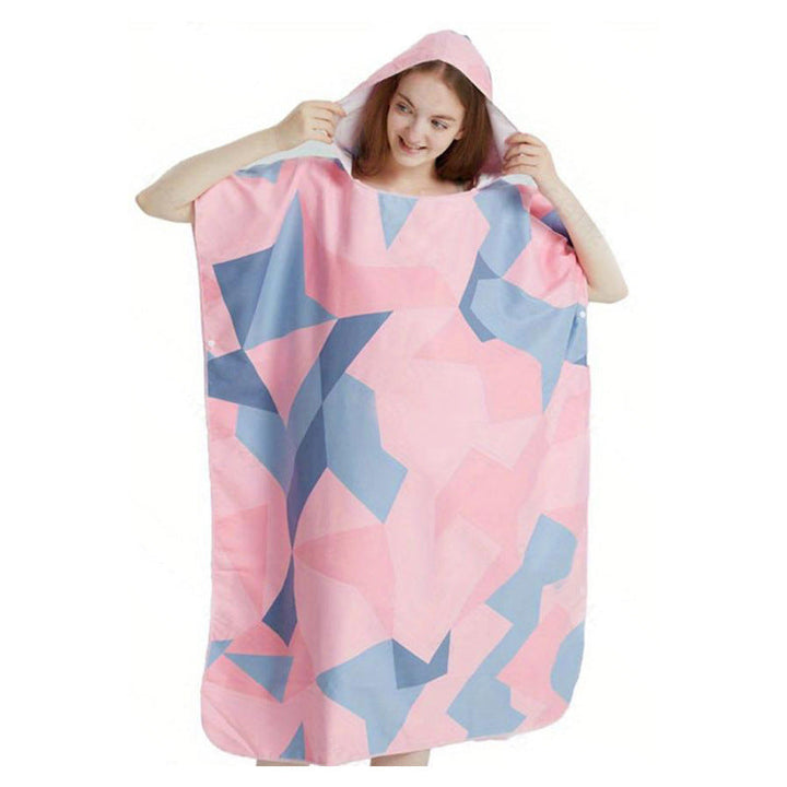 Komfortabel fargerik hetteponcho for damer, ideell som badehåndkle og for avslapning på ferie.