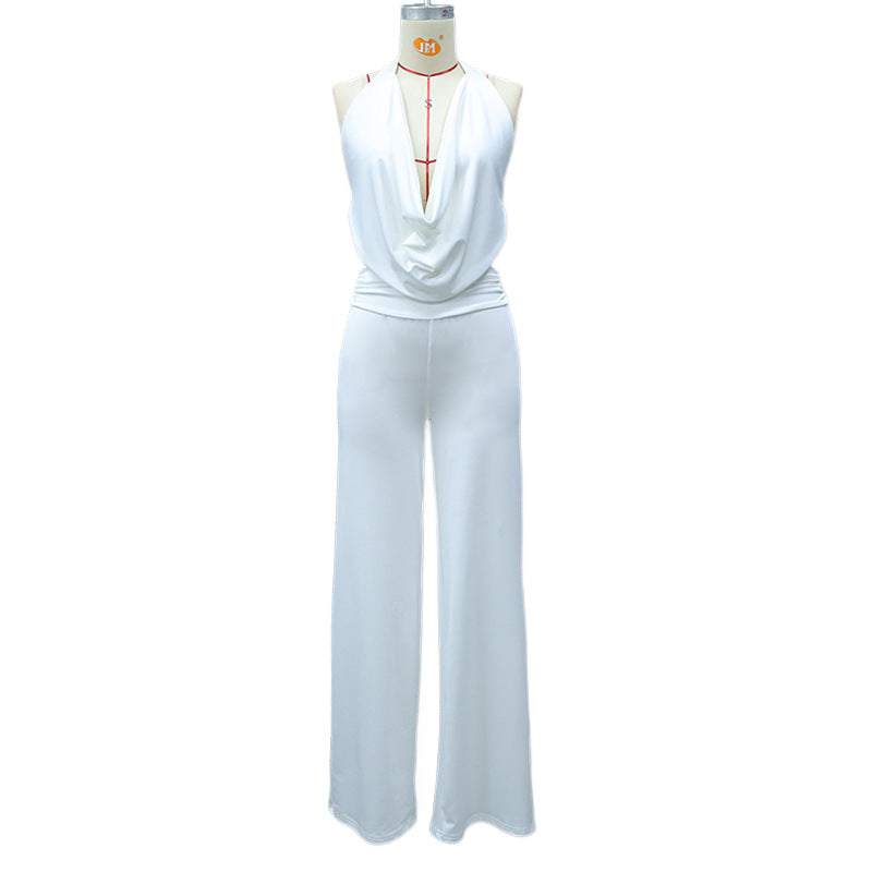 Stilig dame jumpsuit med elegant v-hals og flytende vide ben, et perfekt kvelds- og festantrekk.