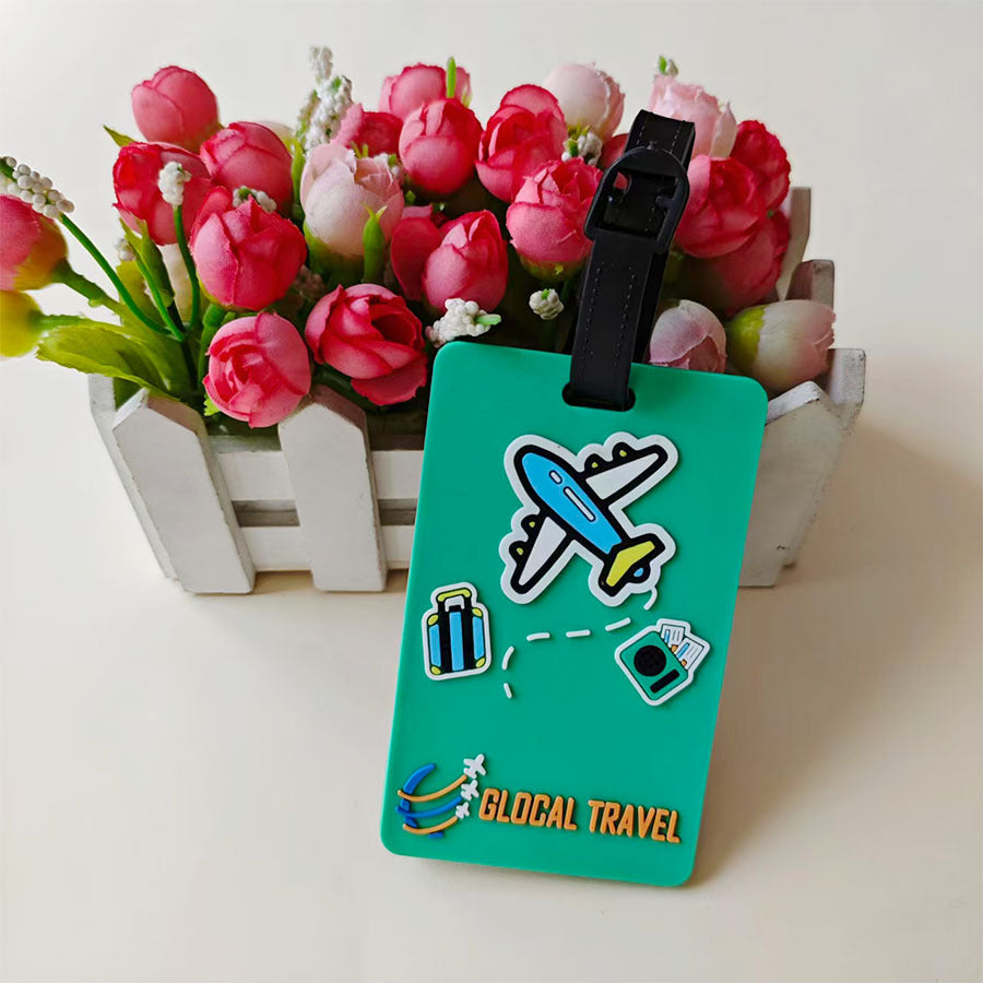 Unisex bagasjelapp med flydesign og plass til kontaktinfo. Robust silikon koffertmerke for enkel identifikasjon.