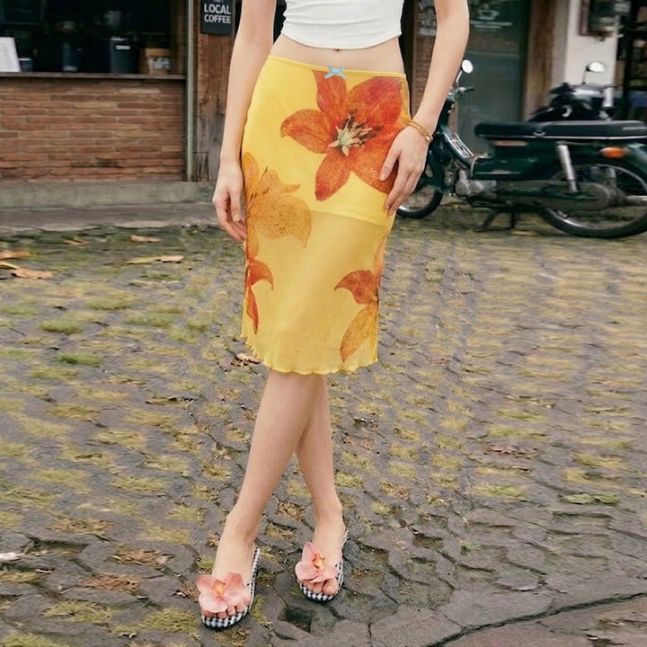 Blomstrete A-linje midi skjørt for dame, perfekt for vår- og sommermote med elastisk midje.