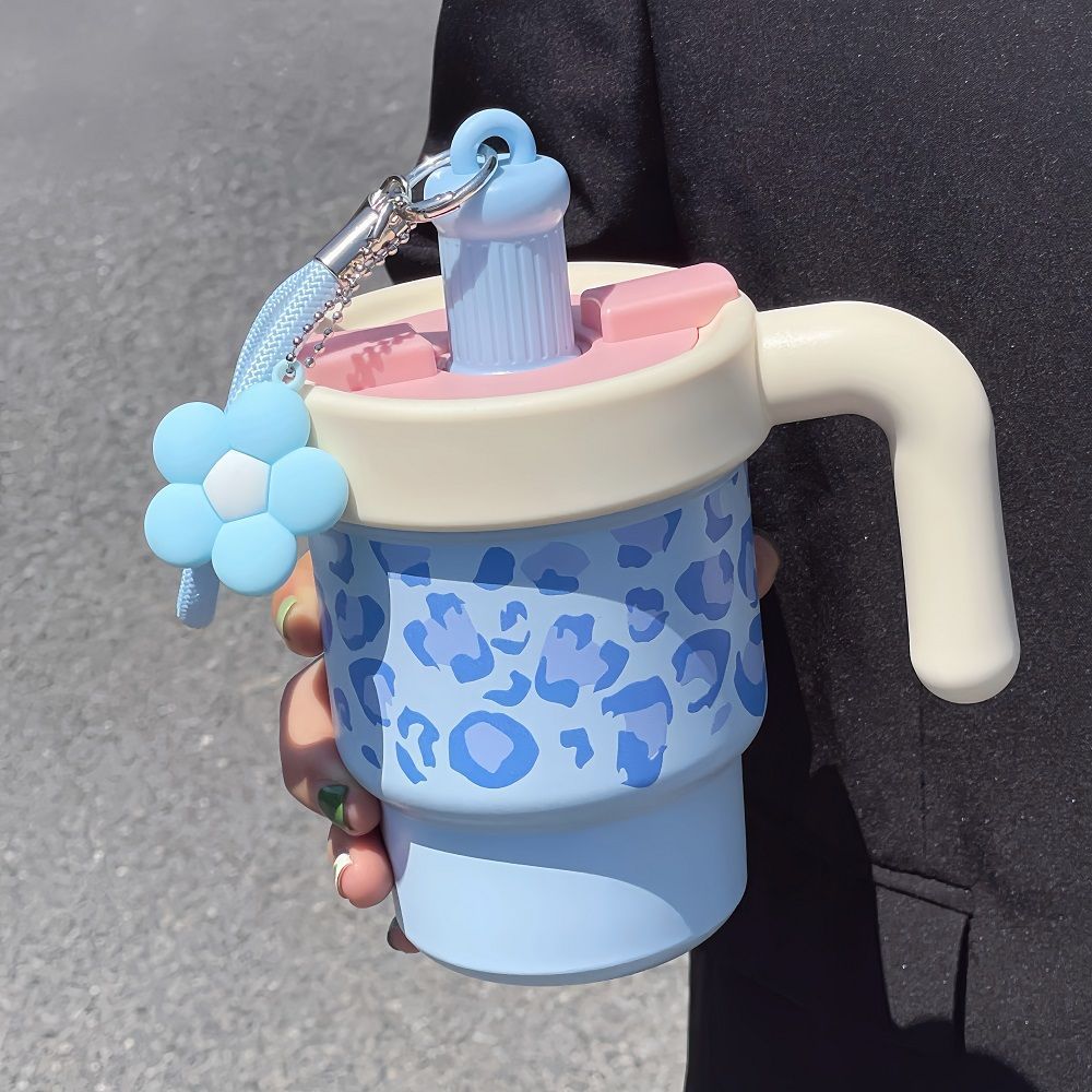 Dame termokopp med dyredesign, perfekt som gjenbrukbar reisekrus. Isolerende tekop med kreativt håndtak.