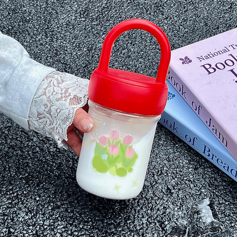 Gjenbrukbar drikkeflaske for damer, med tulipanmønster og bærehåndtak, ideell for hverdagsbruk.