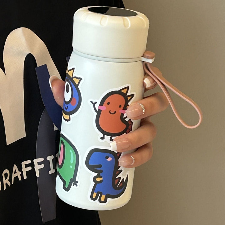 Grønn 400ml vannflaske med klistremerker, perfekt for hydrering. BPA-fri drikkeflaske for kvinner.