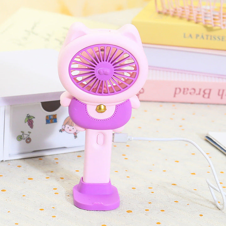 Brun USB håndvifte i dyredesign. Praktisk bærbar minivifte for sommeren, en kul avkjølings-gadget.