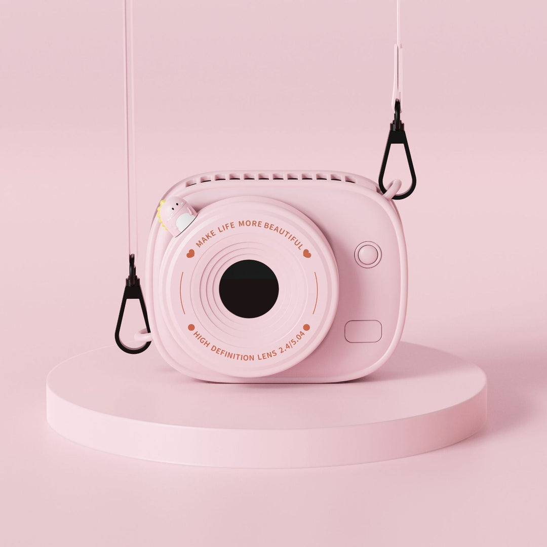 Kompakt, rosa dame øyeblikkskamera for spontan fotografering. Perfekt reisefølge og livsstilskamera.