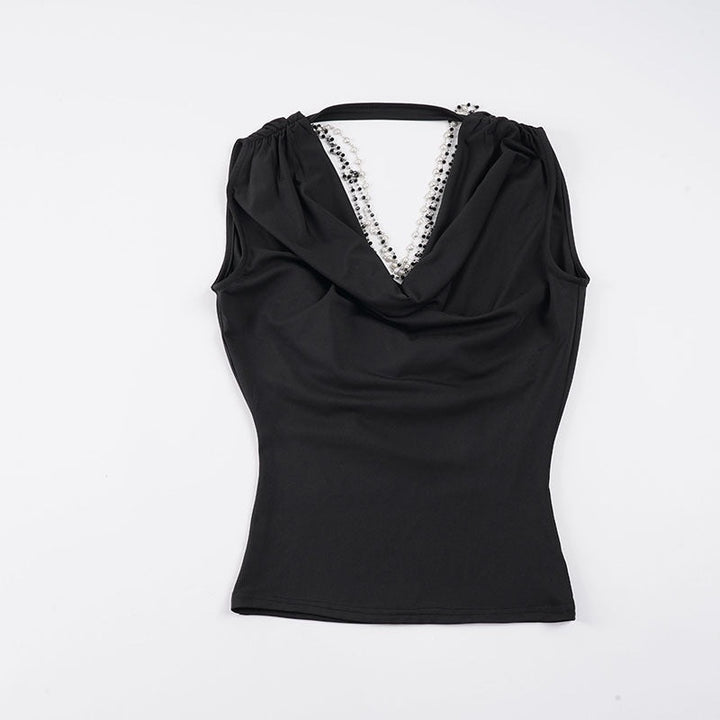 Moderne dametopp: Elegant tanktopp med perledetaljer og krage, en stilfull og pyntet look.
