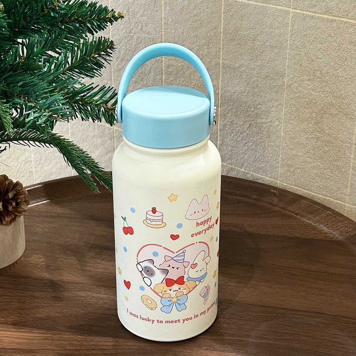 Isolert drikkeflaske 900 ml for dame, blå med dyremotiv. Ideell termos for tur, trening og daglig bruk.