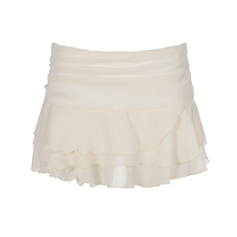 Sommerlig volangskjørt med elegant snitt. Perfekt for både hverdag og fest, med lettvekt og feminint design.