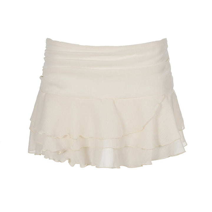 Sommerlig volangskjørt med elegant snitt. Perfekt for både hverdag og fest, med lettvekt og feminint design.