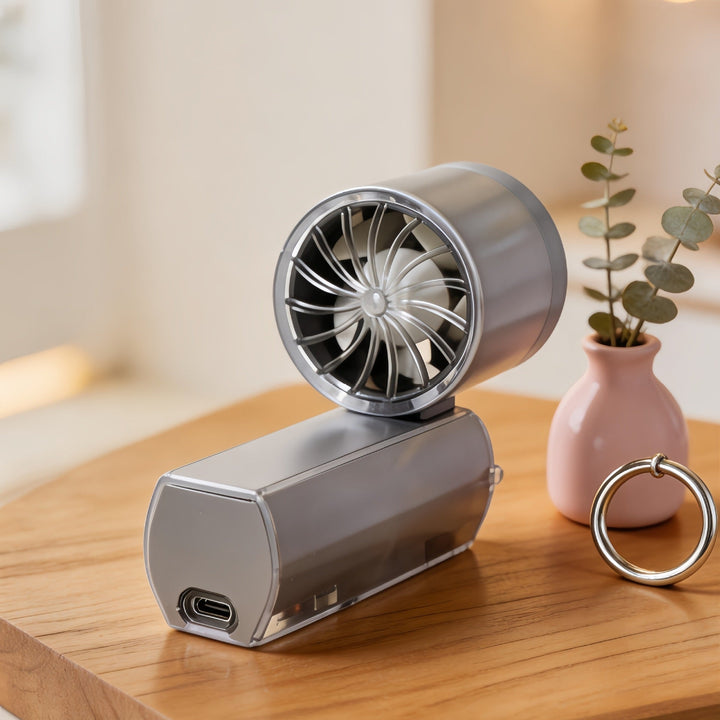 Dame minivifte med USB-lading og integrert LED-lys. Perfekt bærbar vifte for enkel og rask kjøling.