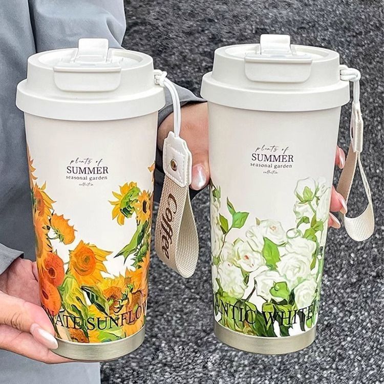 Hvit dame termokopp i rustfritt stål. Holder drikken varm i timevis og kald like lenge. Perfekt for kaffe og te.